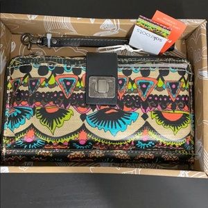 Sakroot large smartphone crossbody. New in box!!